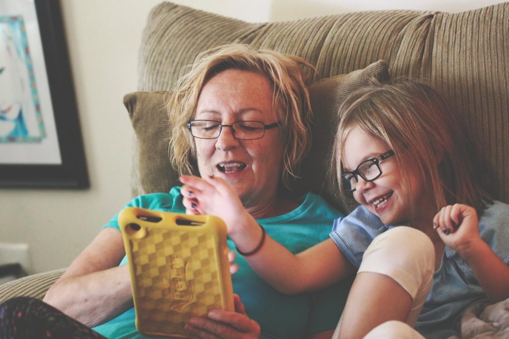 children and parents using technology together